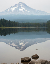 Mount Hood mirrored in a placid lake below